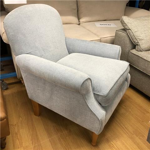 Famous Name armchair / accent chair in a soft, pale blue weave fabric